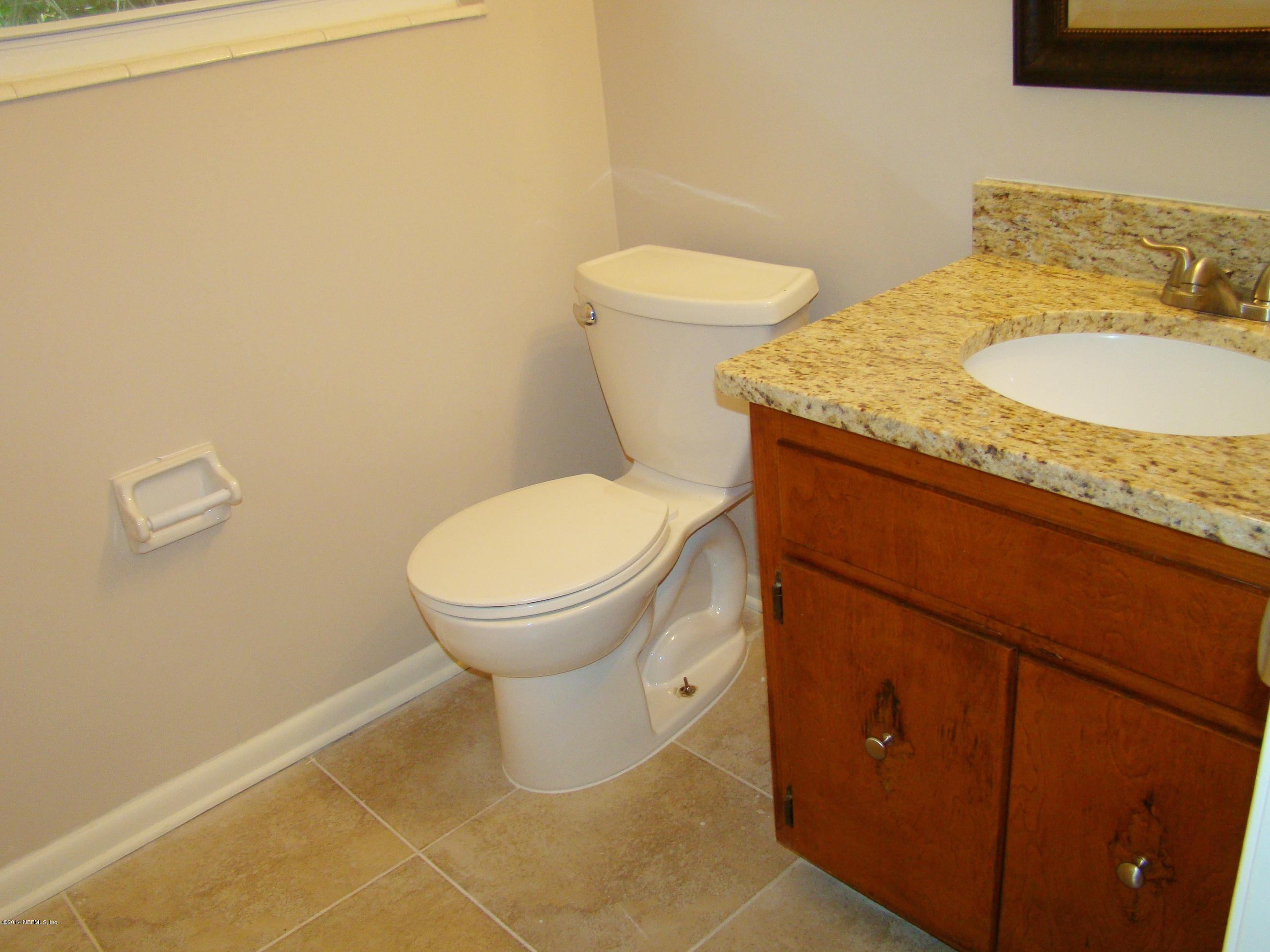 3329 Debussy Road Jacksonville, FL 32277 - Photo 26 of 28 HALF BATH BY LAUNDRY ROOM