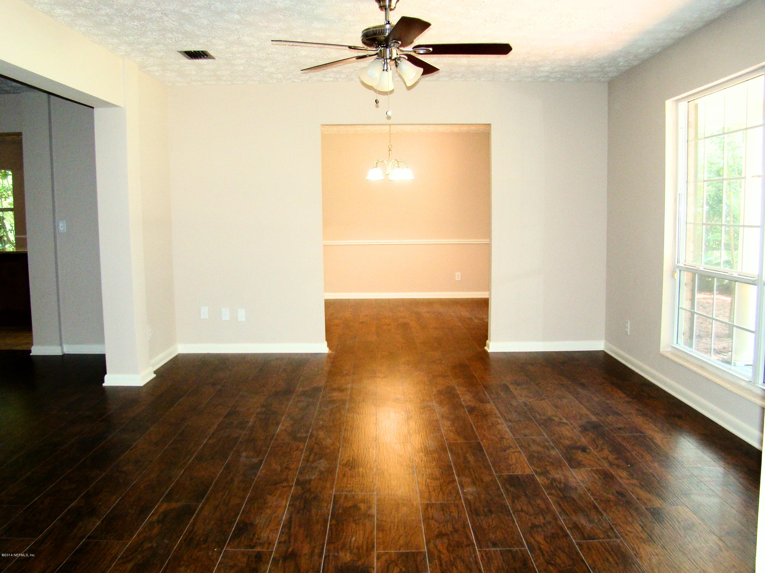 3329 Debussy Road Jacksonville, FL 32277 - Photo 7 of 28 LIVING ROOM VIEW 2