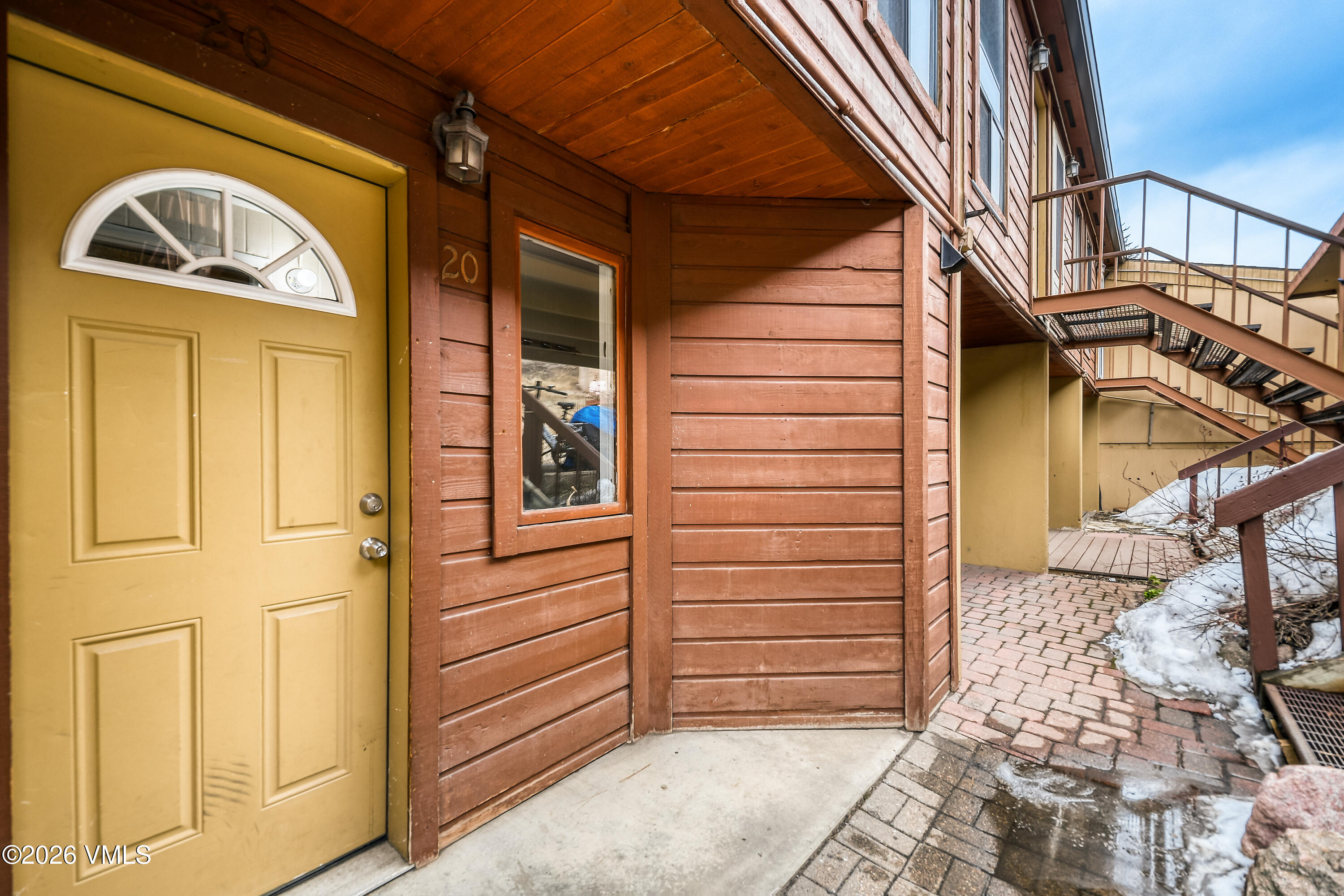 4506 Spruce Way, Unit 20 Vail, CO 81657 - Photo 1 of 17 a view of a entryway door of the house