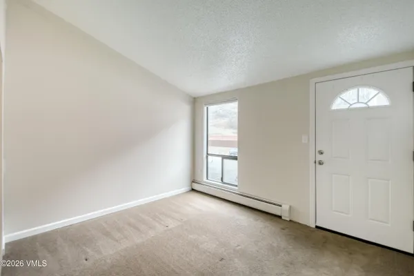 an empty room with a window