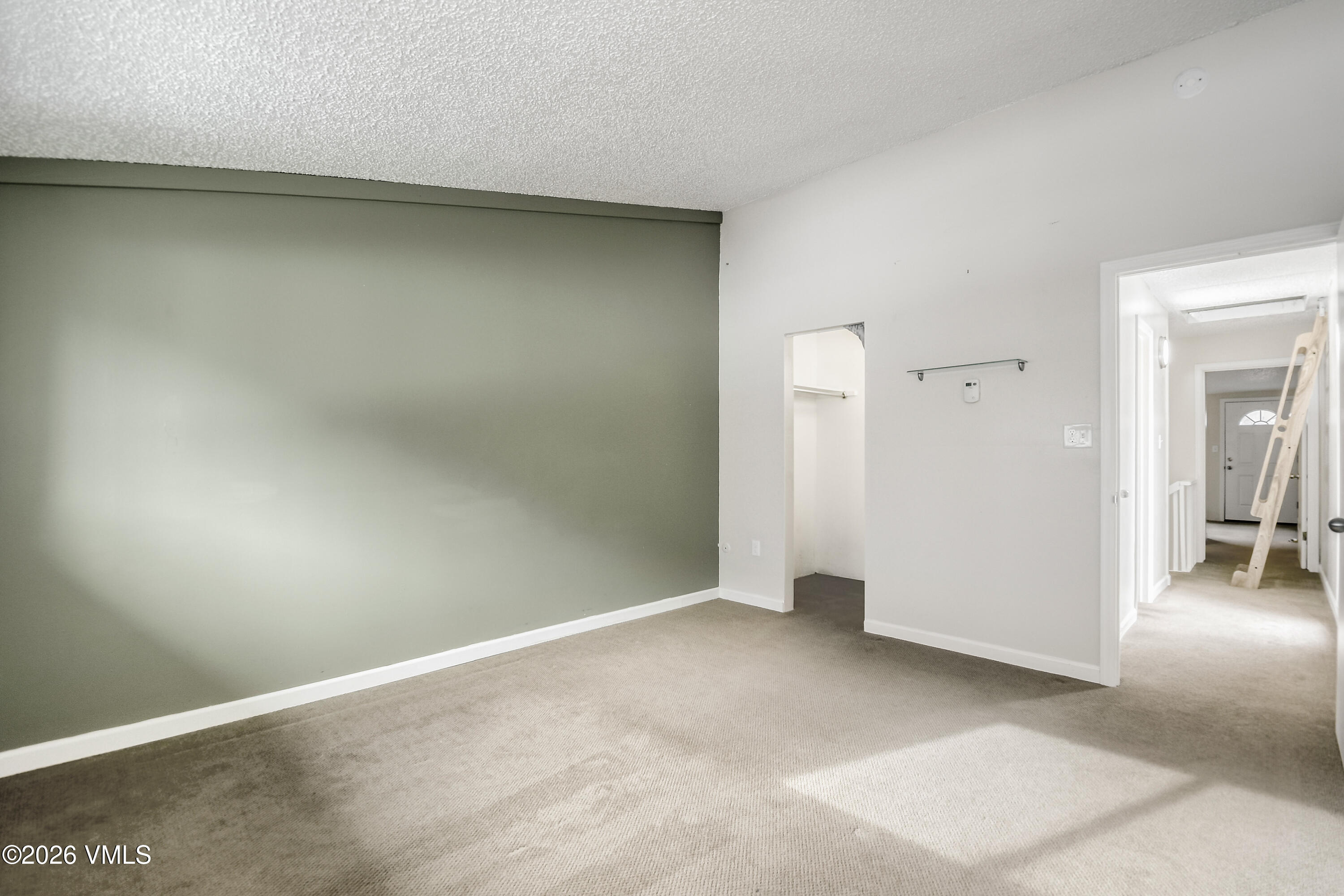 4506 Spruce Way, Unit 20 Vail, CO 81657 - Photo 9 of 17 an empty room with closet