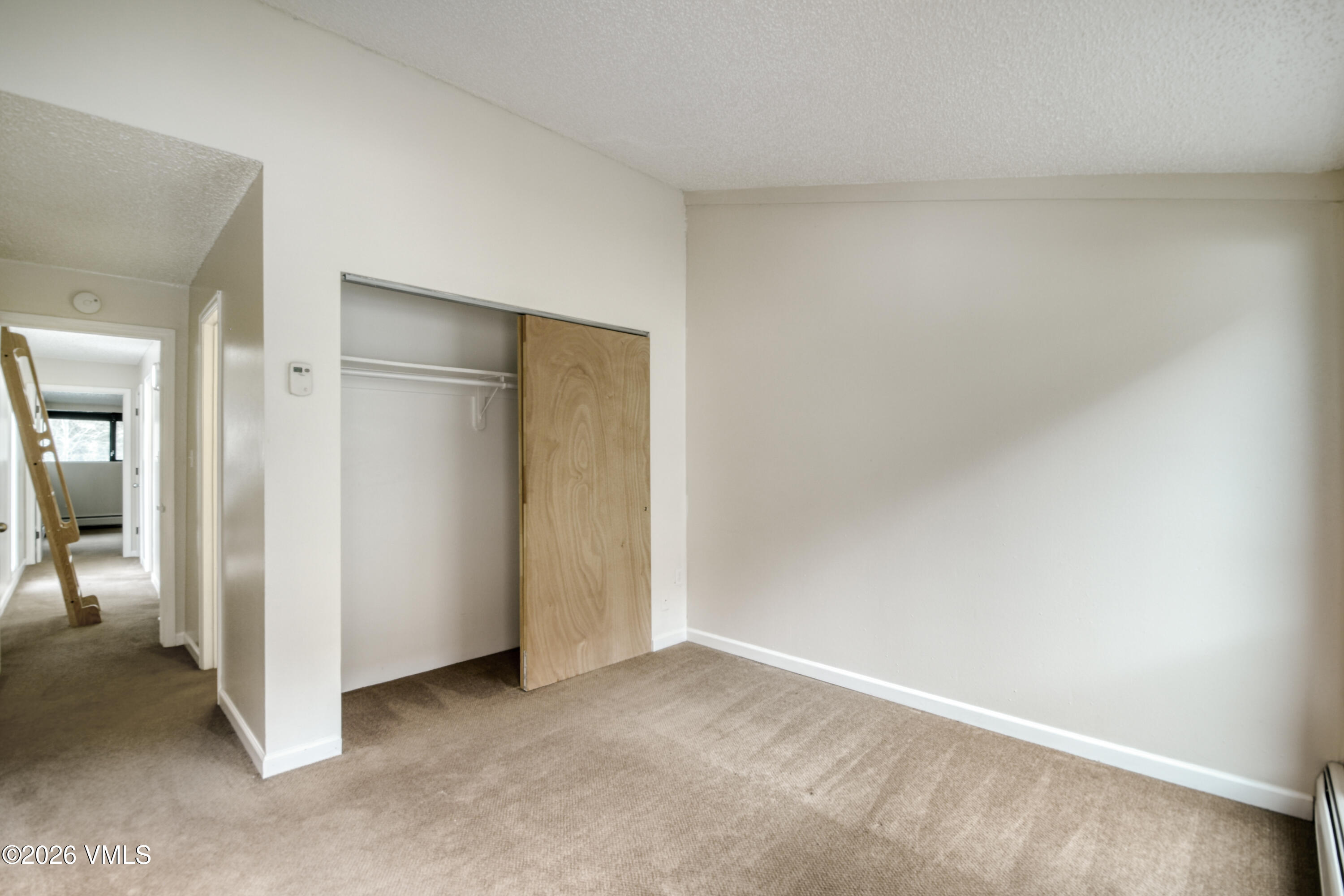 4506 Spruce Way, Unit 20 Vail, CO 81657 - Photo 10 of 17 an empty room with closet