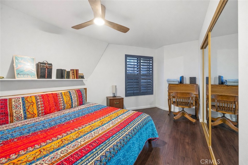 1349 Valley View Way Crestline, CA 92325 - Photo 23 of 43 a bedroom with furniture and a book shelf