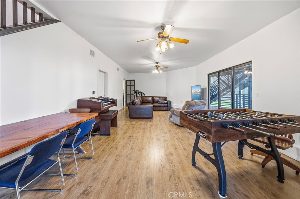 1349 Valley View Way Crestline, CA 92325 - Photo 25 of 43 a view of a dining room with furniture and wooden floor