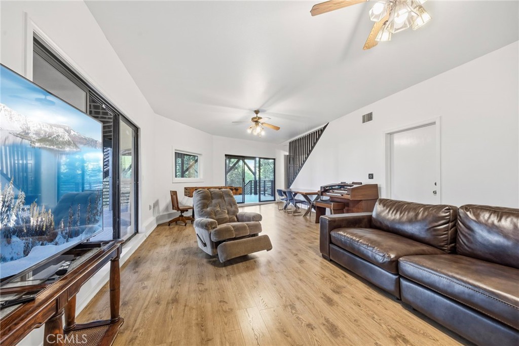 1349 Valley View Way Crestline, CA 92325 - Photo 27 of 43 a living room with furniture and a wooden floor
