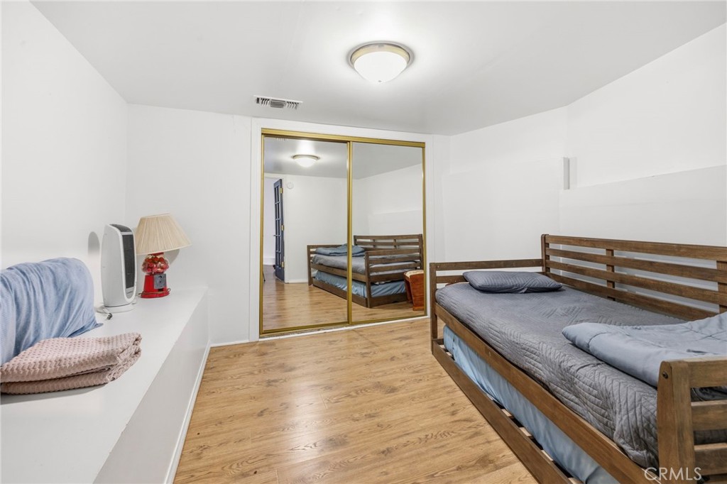 1349 Valley View Way Crestline, CA 92325 - Photo 28 of 43 a living room with furniture and a wooden floor