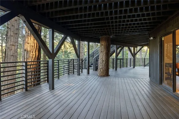 a view of porch with wooden floor