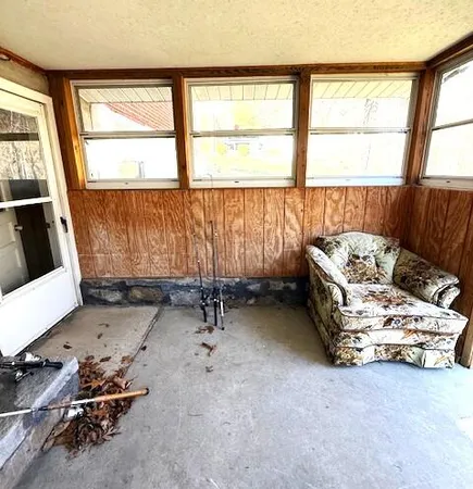 a room with furniture and a window