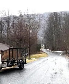 a view of a swimming pool with a slide