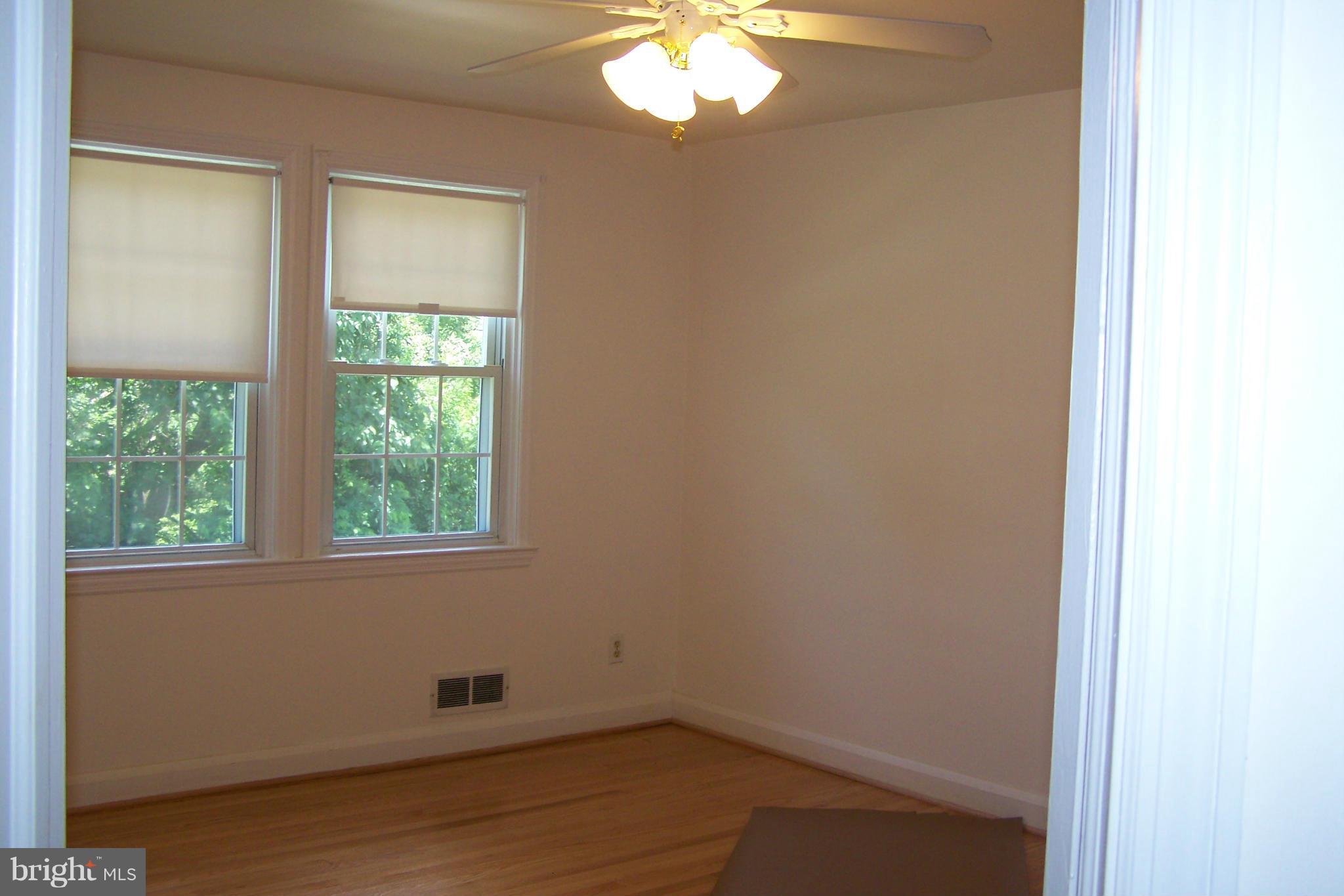 1111 Granville Road Baltimore, MD 21207 - Photo 11 of 19 an empty room with a window