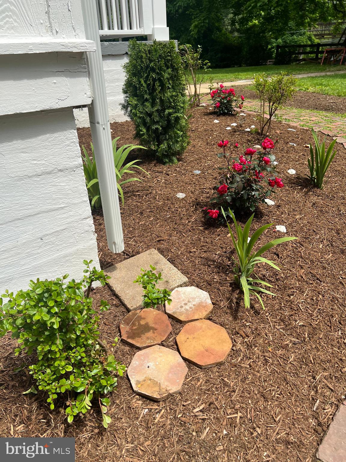 7308 Highbridge Road Bowie, MD 20720 - Photo 13 of 70 a view of a backyard with chair and table