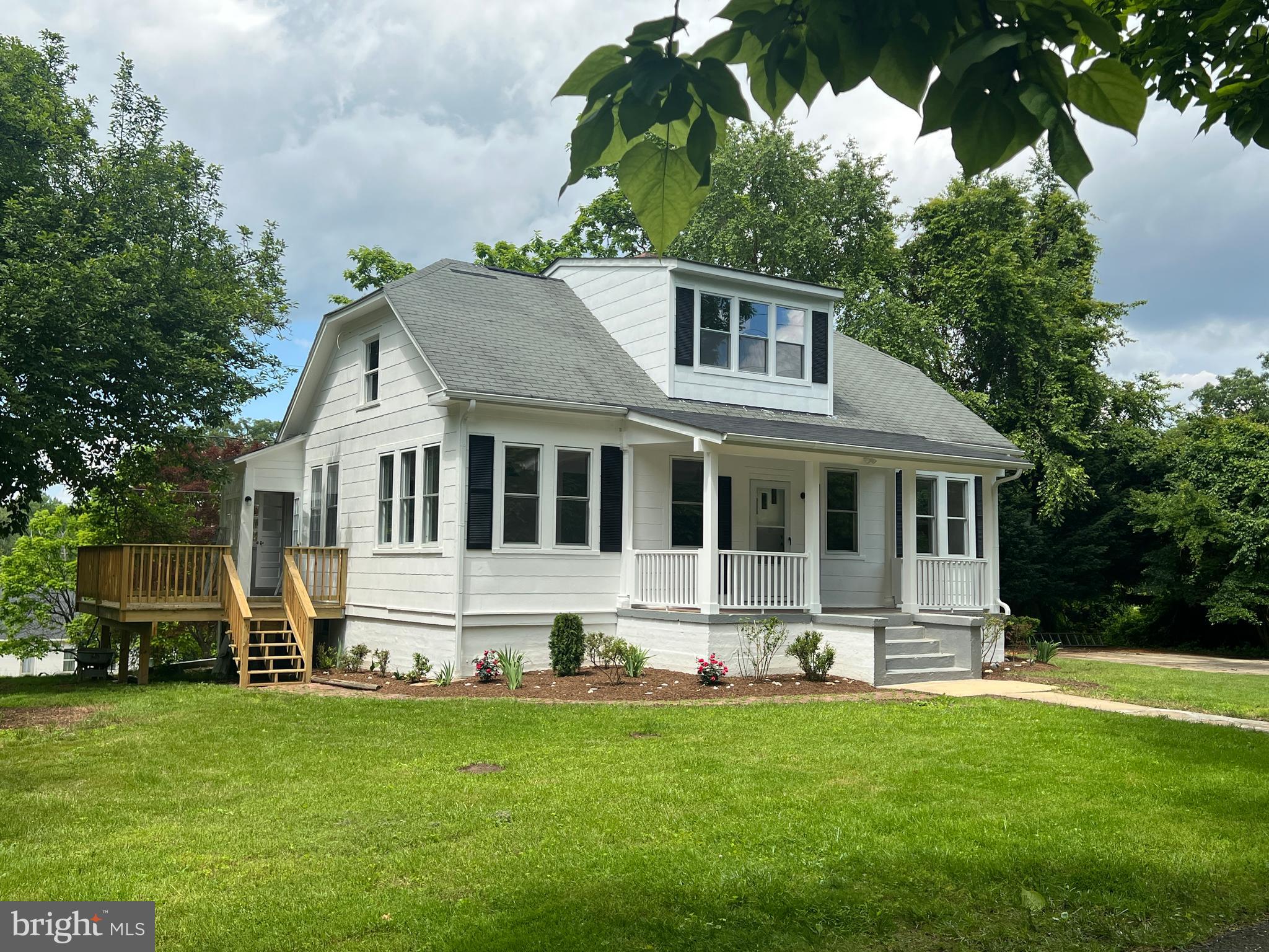 7308 Highbridge Road Bowie, MD 20720 - Photo 2 of 70 a front view of house with yard and green space