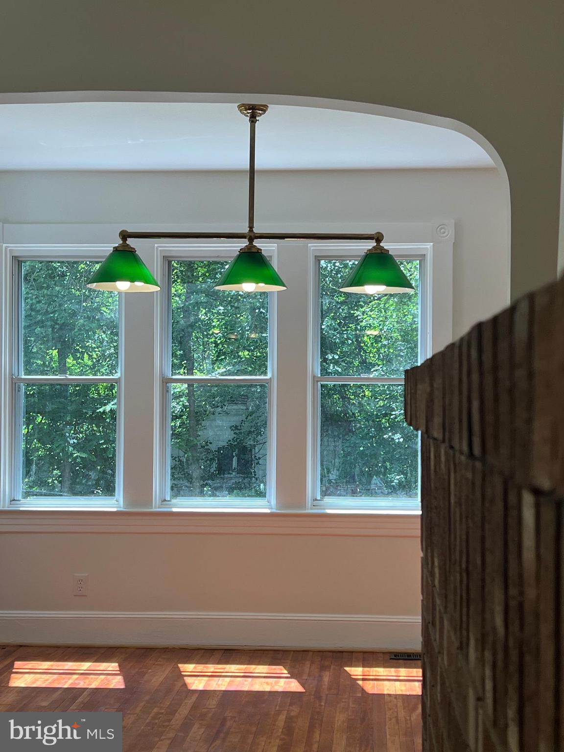7308 Highbridge Road Bowie, MD 20720 - Photo 25 of 70 a view of a porch with furniture and a yard
