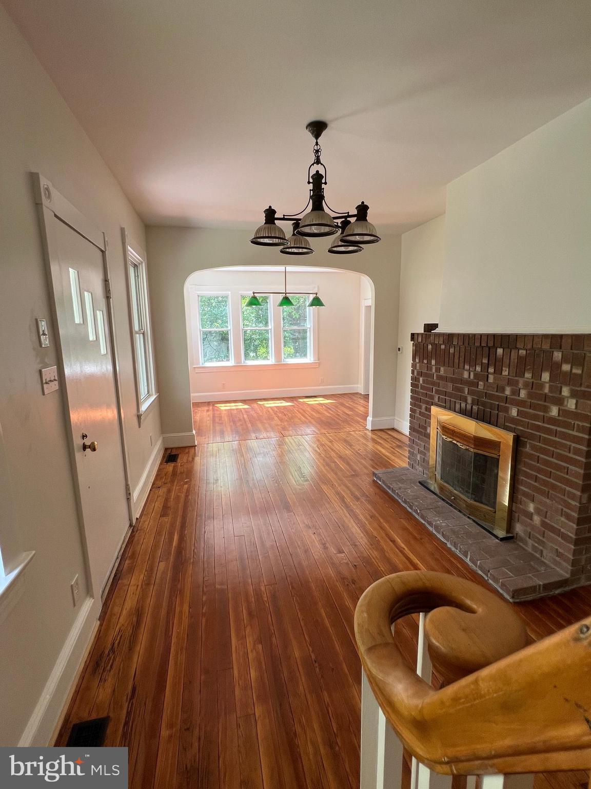 7308 Highbridge Road Bowie, MD 20720 - Photo 39 of 70 a living room with furniture and a fireplace