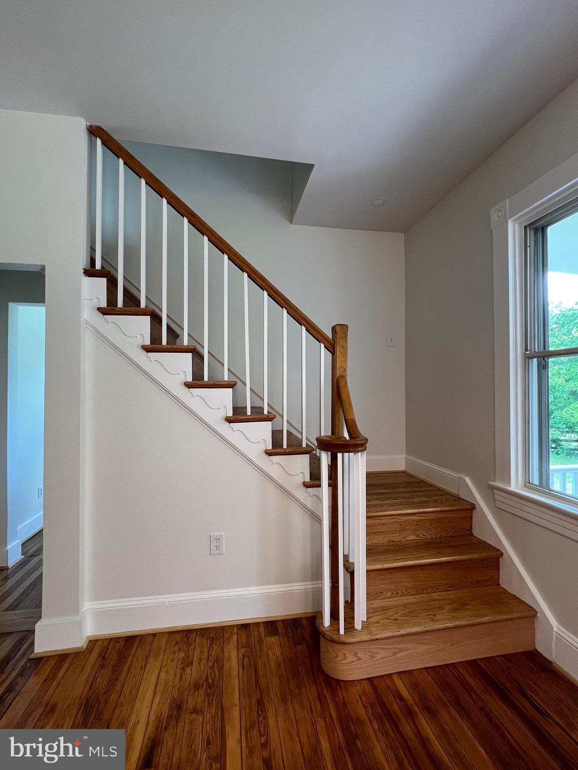 7308 Highbridge Road Bowie, MD 20720 - Photo 46 of 70 a view of entryway and hall with wooden floor