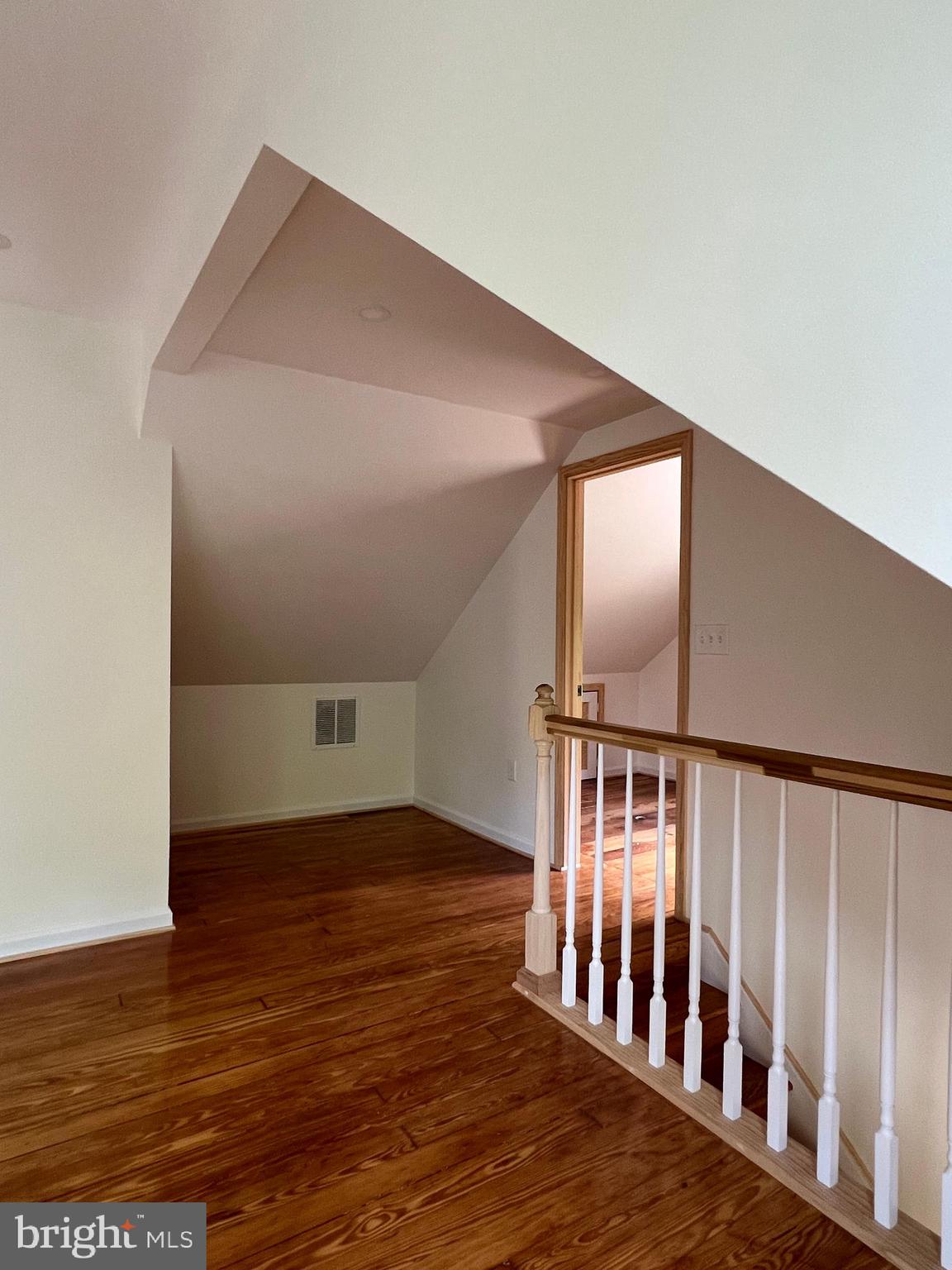 7308 Highbridge Road Bowie, MD 20720 - Photo 52 of 70 a view of staircase with wooden floor