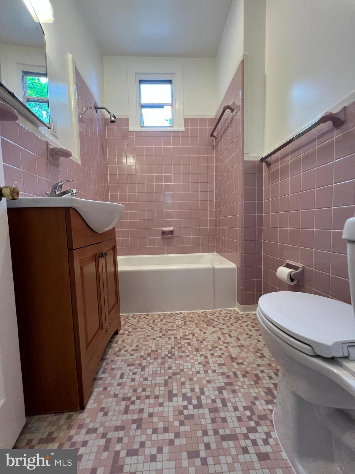 7308 Highbridge Road Bowie, MD 20720 - Photo 66 of 70 a bathroom with a sink a toilet and bathtub