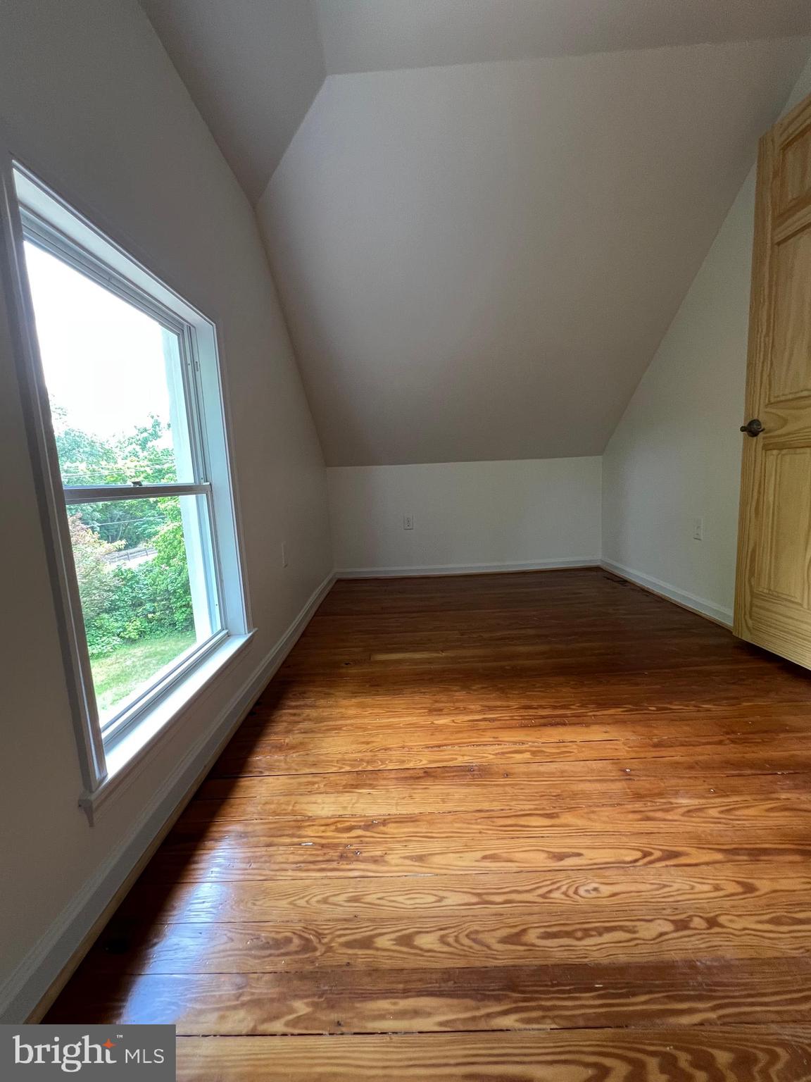 7308 Highbridge Road Bowie, MD 20720 - Photo 70 of 70 a view of empty room with wooden floor and fan