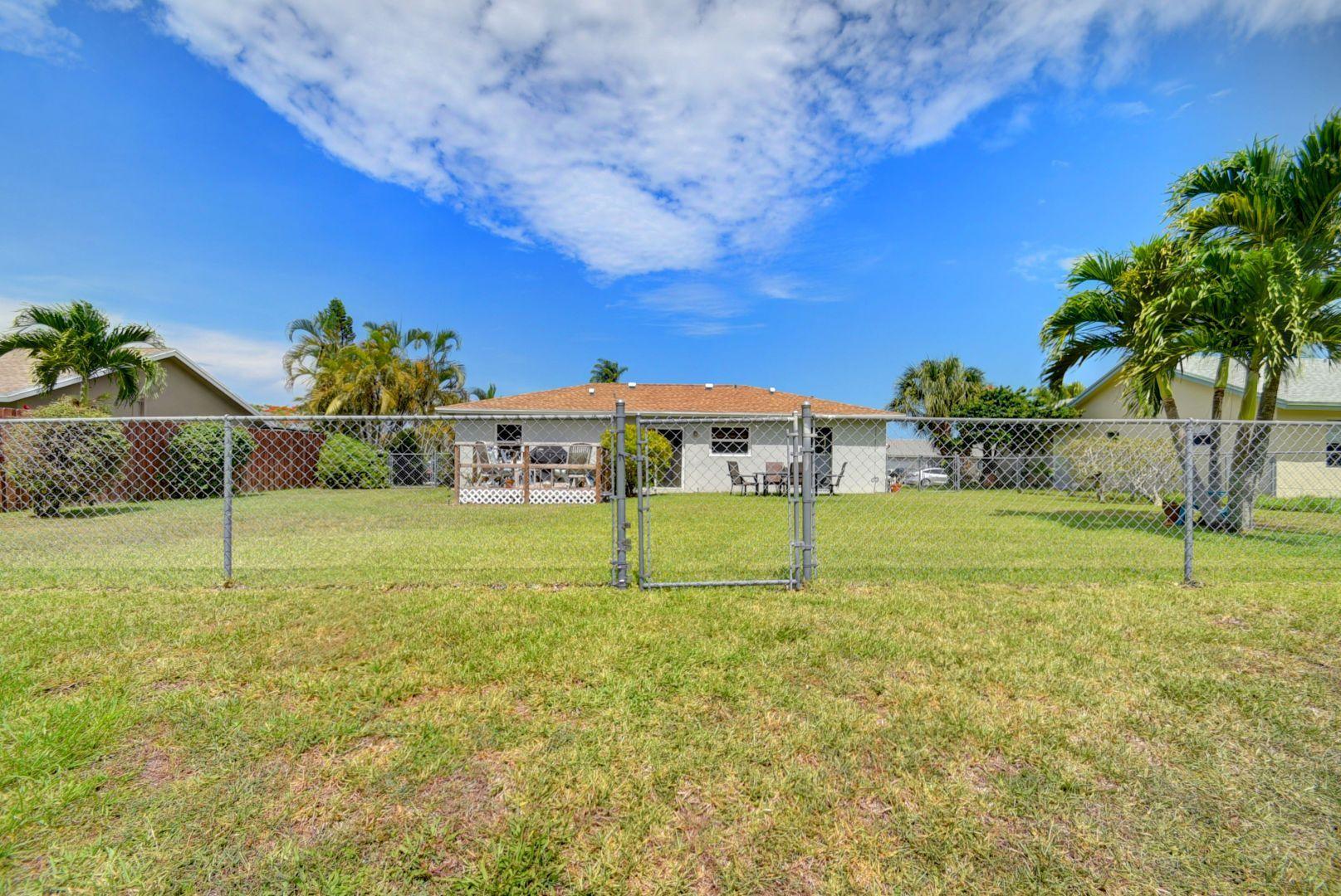 19445 Carolina Circle Boca Raton, FL 33434 - Photo 24 of 34 RearBeyondFence