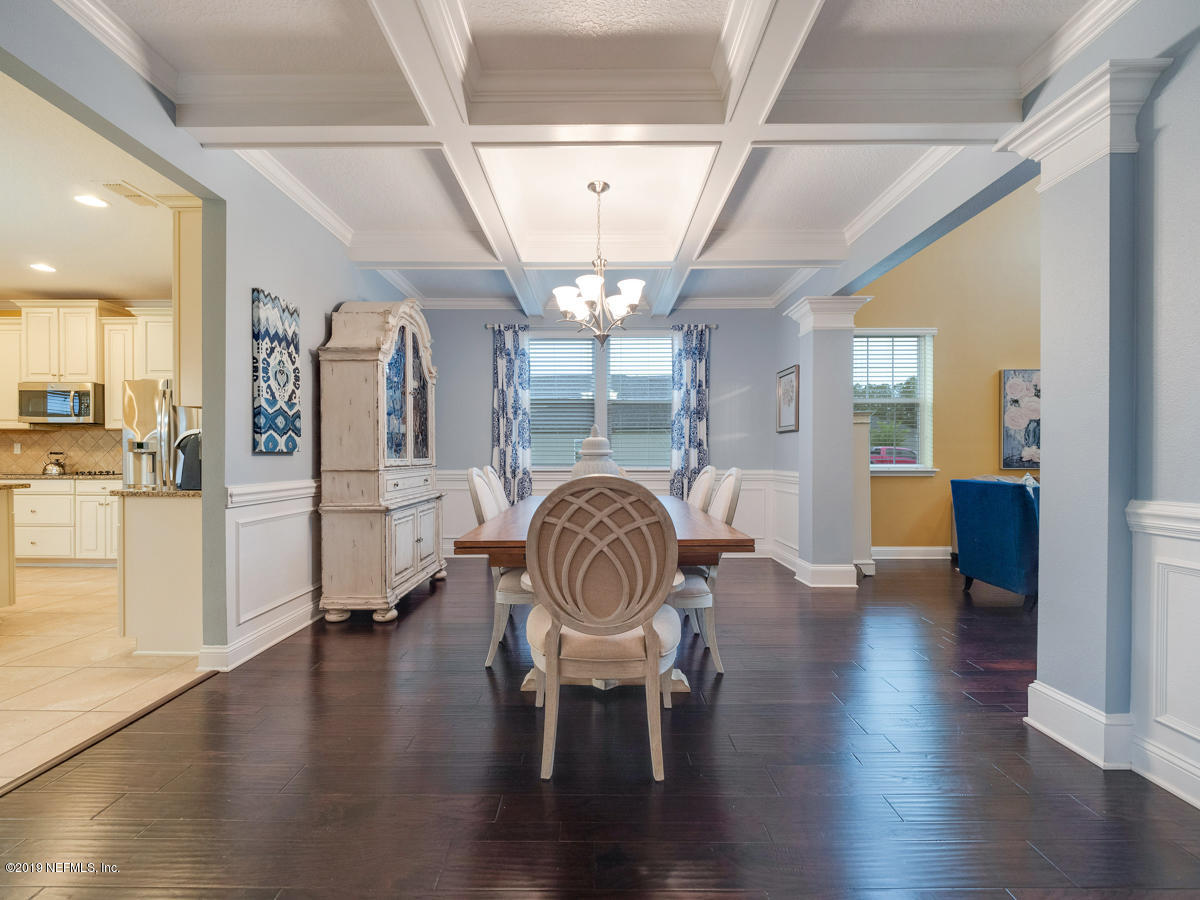 702 Irish Rose Road St. Augustine, FL 32092 - Photo 14 of 53 a view of kitchen with furniture and wooden floor