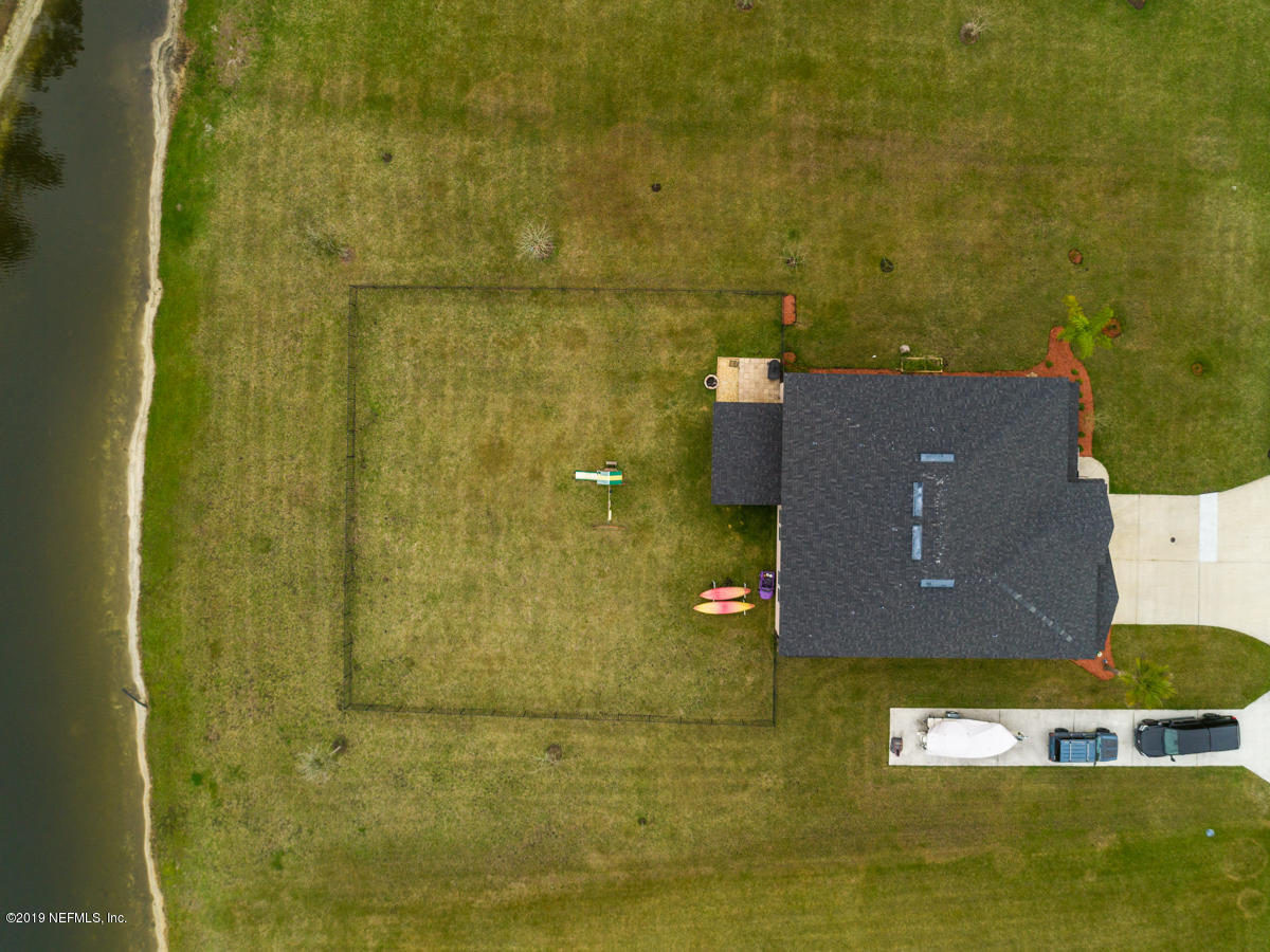 702 Irish Rose Road St. Augustine, FL 32092 - Photo 51 of 53 an aerial view of residential house with pool