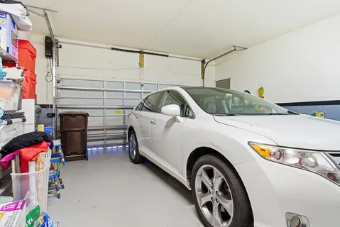 a view of a street with a building in the background