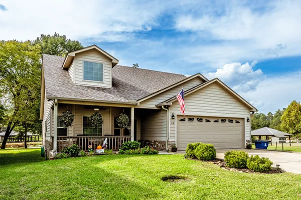 $449,500 | 14 Wildwood Lake Drive, Huntsville, TX 77340