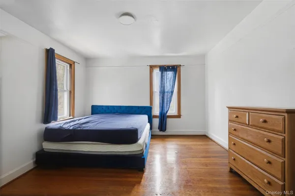 a living room with furniture and a gate