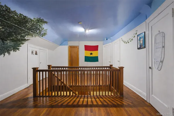 a view of entryway with wooden floor