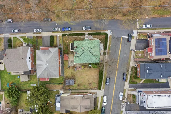 an aerial view of a building with outdoor space