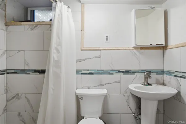 a bathroom with a sink and mirror