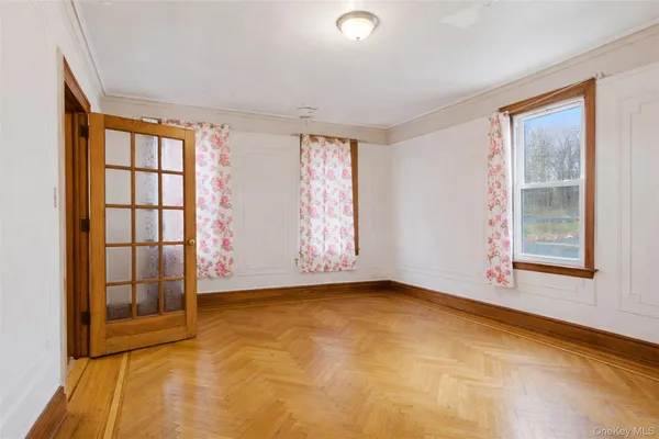 an empty room with windows