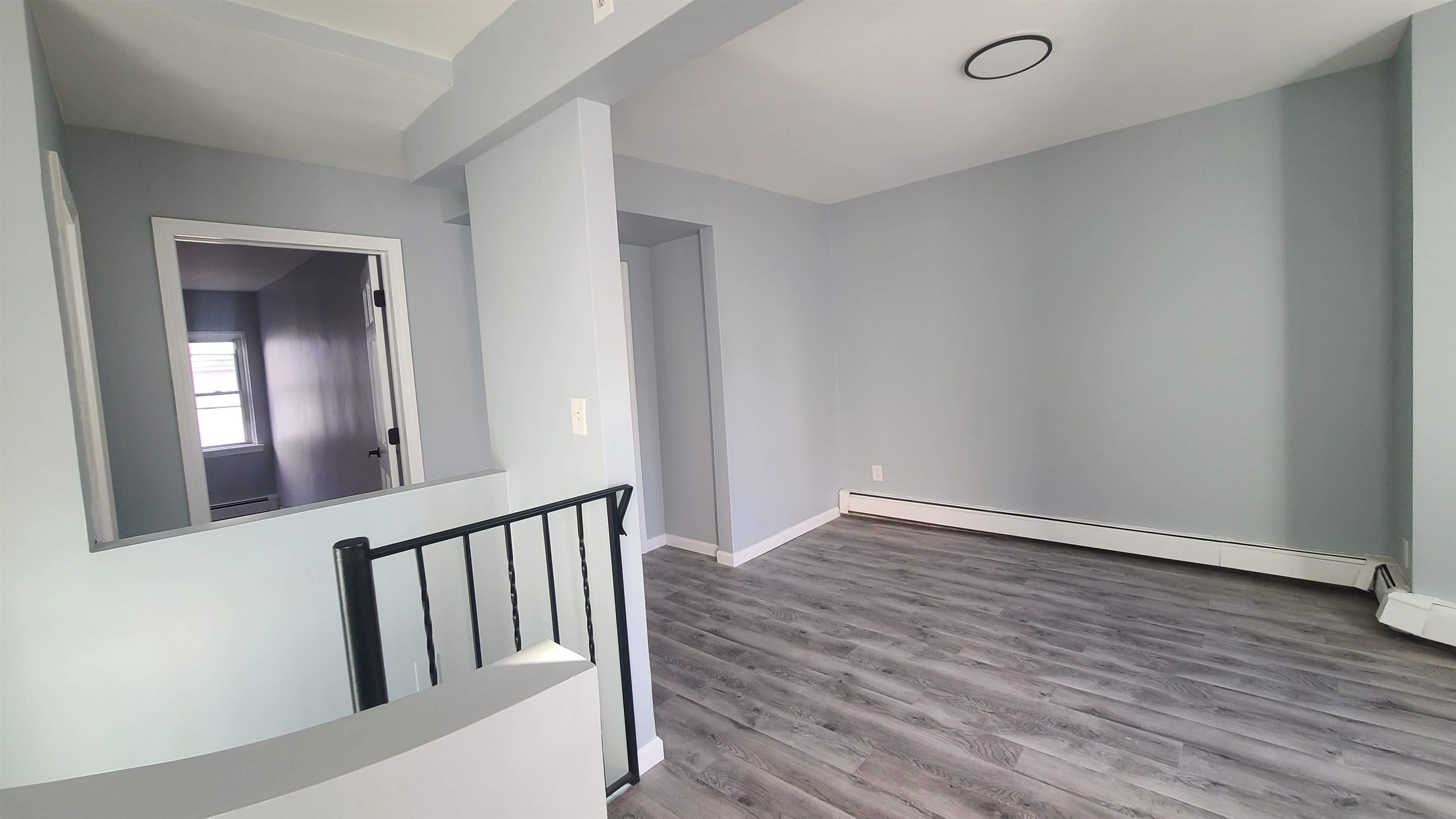 6206 Newkirk Avenue, Unit 1 North Bergen, NJ 07047 - Photo 3 of 20 wooden floor in a hallway