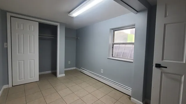 an empty room with window