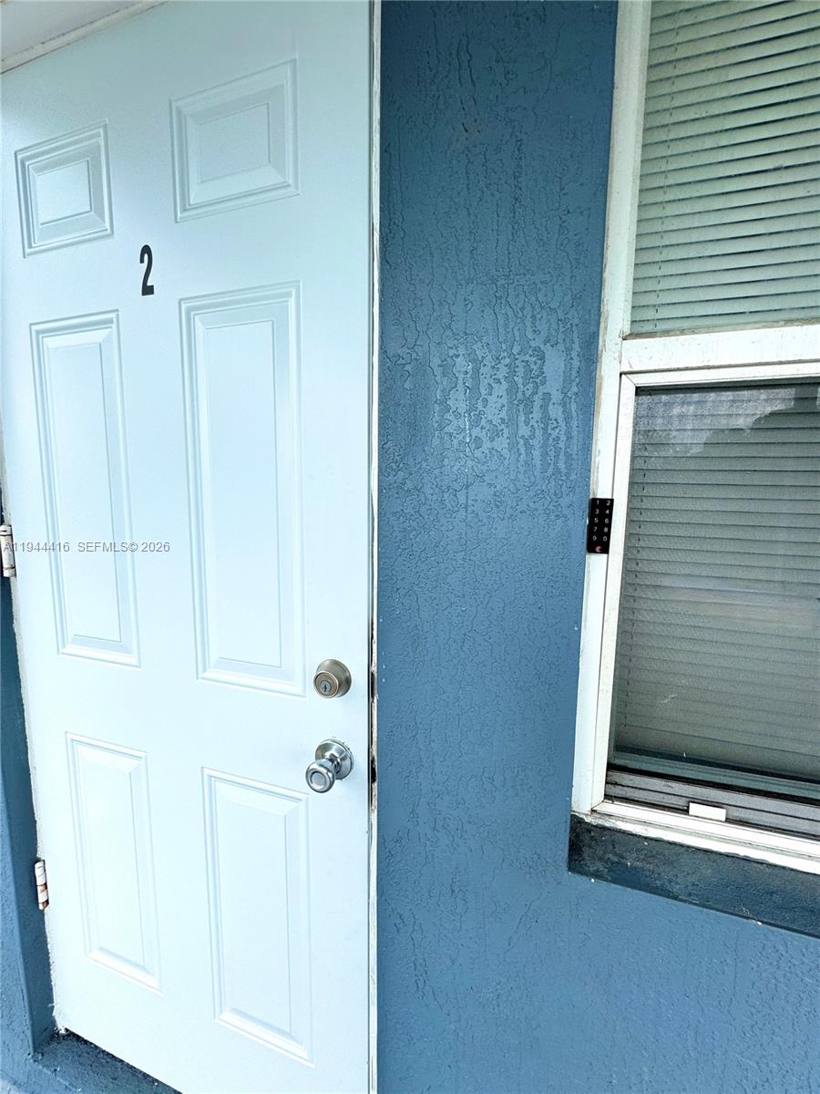 1821 Northwest 33rd Street Miami, FL 33142 - Photo 6 of 18 a view of a door