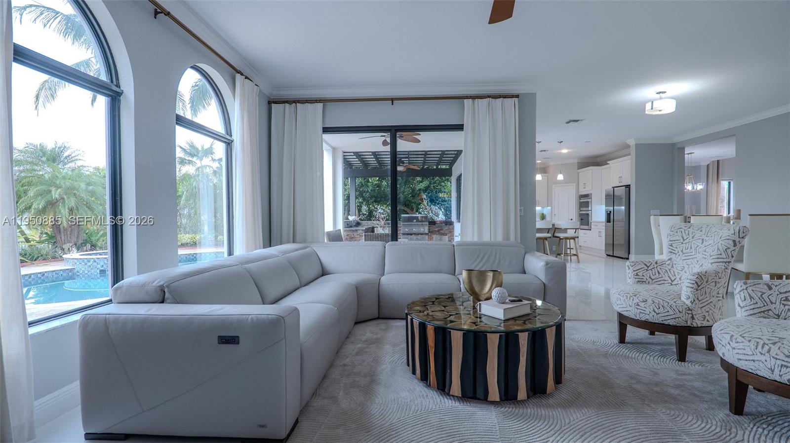 18540 Southwest 43rd Street Miramar, FL 33029 - Photo 17 of 56 a living room with furniture and a large window