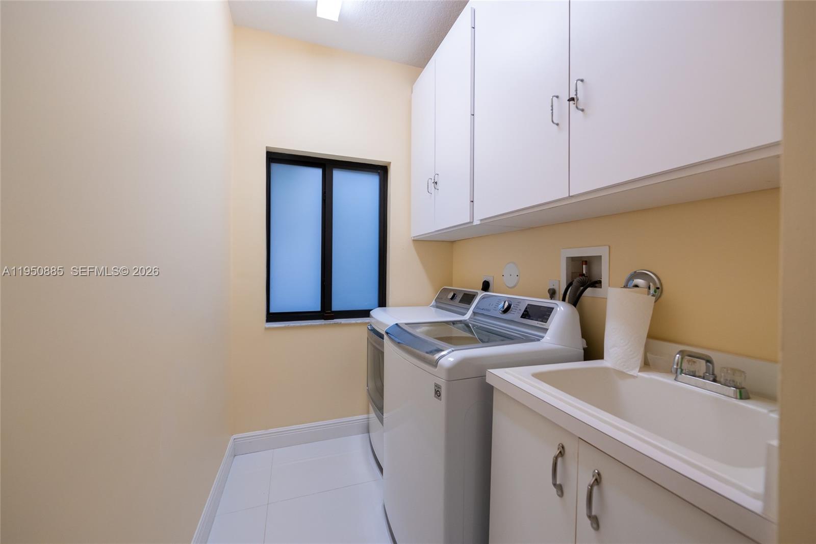 18540 Southwest 43rd Street Miramar, FL 33029 - Photo 21 of 56 a utility room with dryer and washer