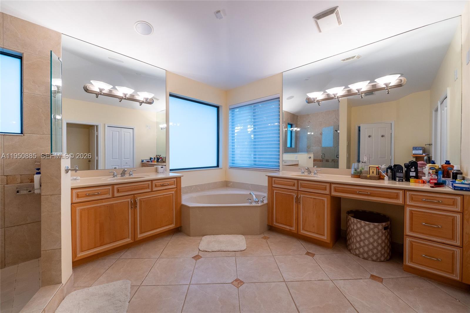 18540 Southwest 43rd Street Miramar, FL 33029 - Photo 28 of 56 a large bathroom with a large tub and sink