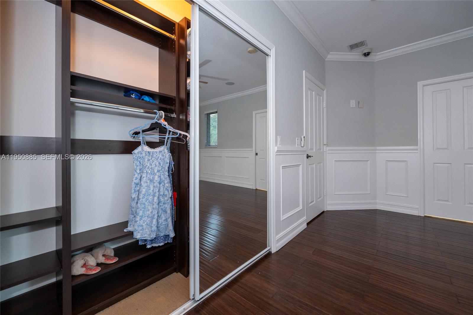 18540 Southwest 43rd Street Miramar, FL 33029 - Photo 39 of 56 a view of walk in closet with clothes and shoes