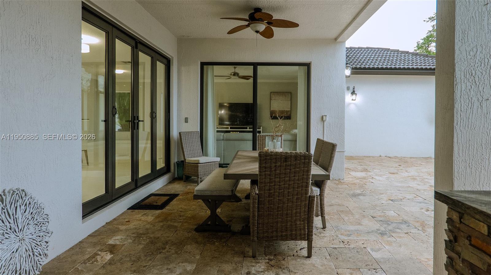 18540 Southwest 43rd Street Miramar, FL 33029 - Photo 46 of 56 a outdoor space with lots of furniture and windows