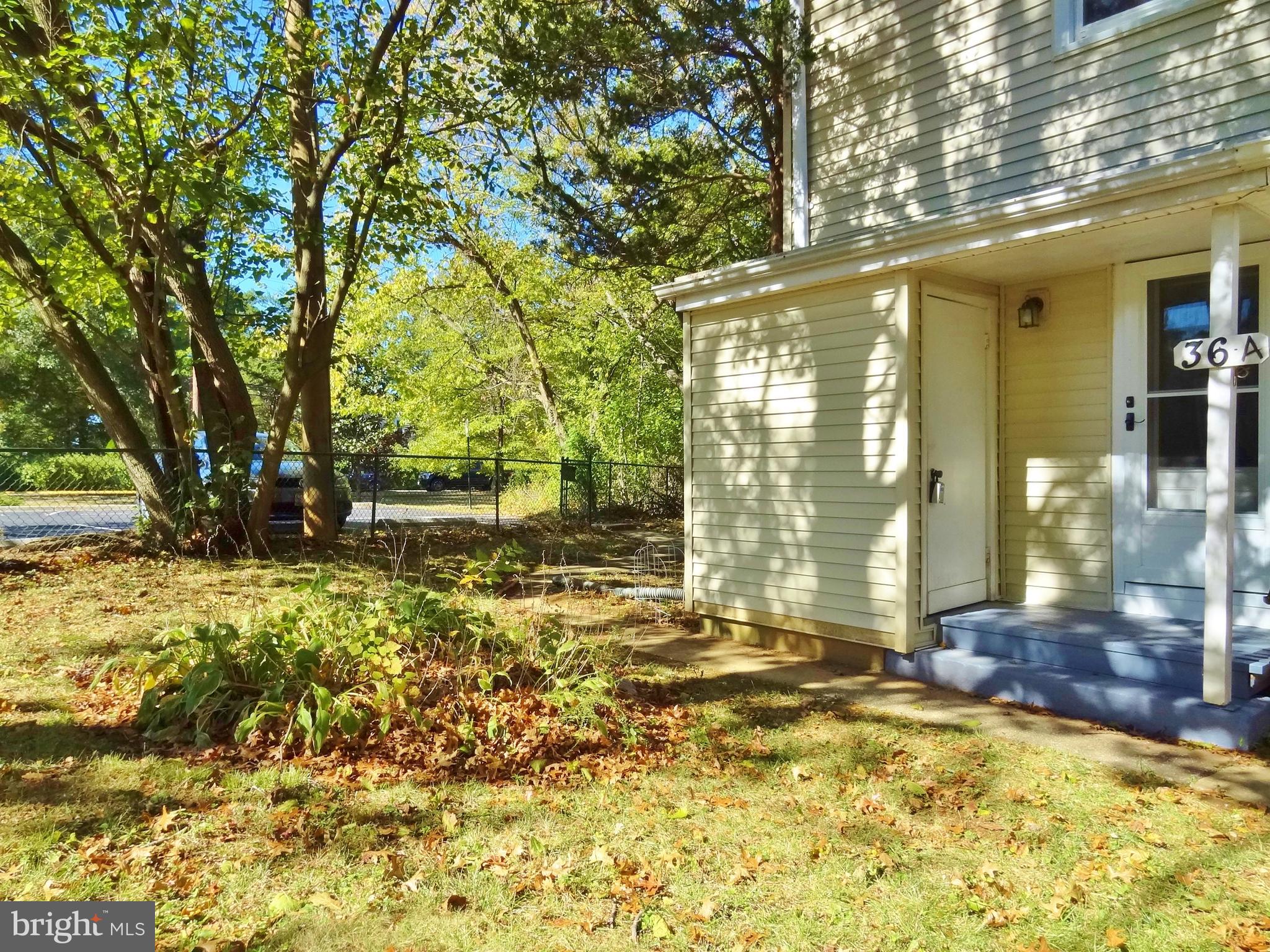 36 Ridge Road, Unit A Greenbelt, MD 20770 - Photo 11 of 14 Front yard and adjacent parking
