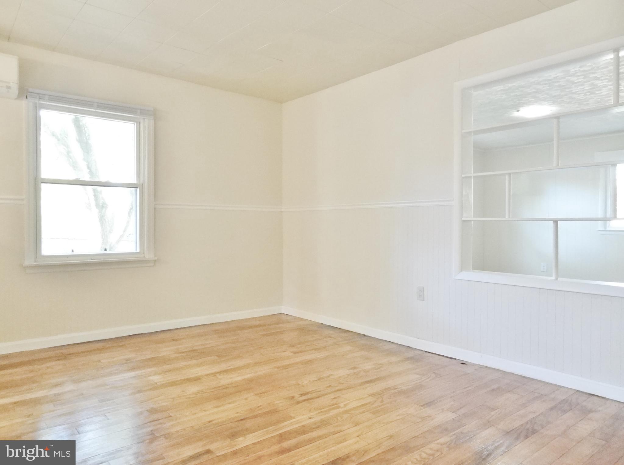 36 Ridge Road, Unit A Greenbelt, MD 20770 - Photo 3 of 14 Living room/dining area