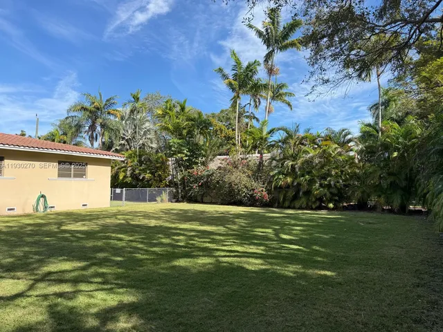 a house with a garden in front of it