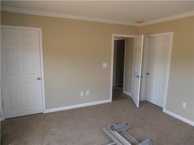 1147 Wrights Mill Road Spring Hill, TN 37174 - Photo 3 of 12 View showing the doors to two of the three closets in master bedroom 1.