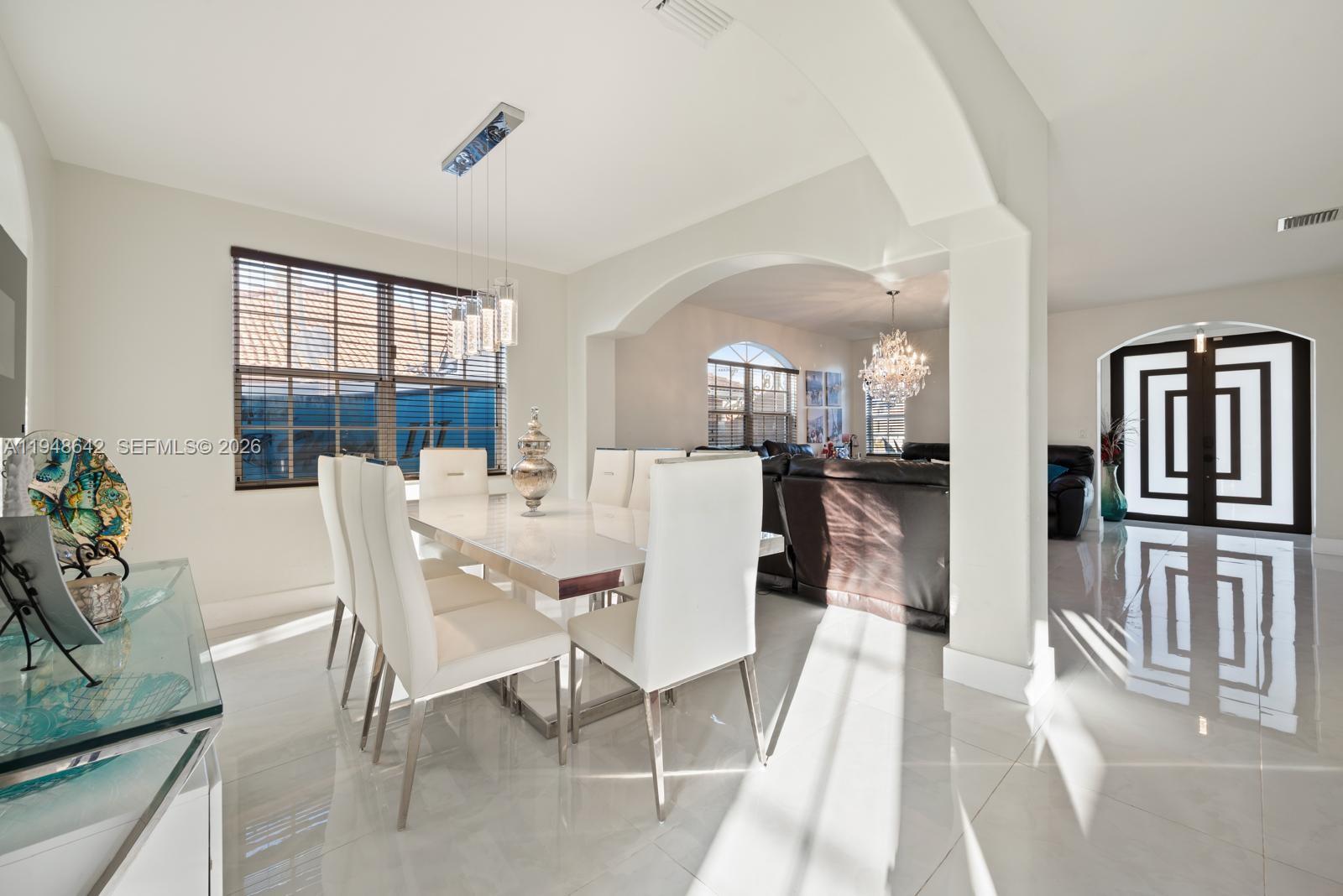 1360 Southwest 142nd Avenue Miami, FL 33184 - Photo 11 of 54 a view of a dining room with furniture and window