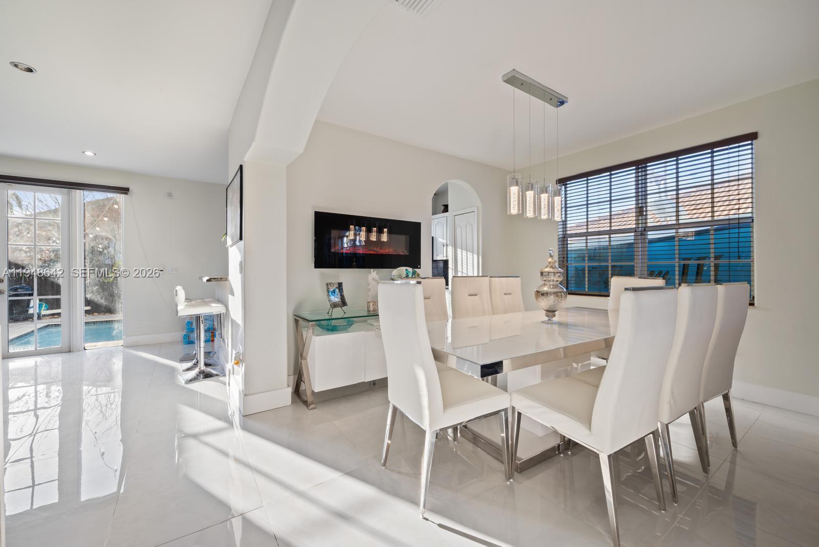 1360 Southwest 142nd Avenue Miami, FL 33184 - Photo 12 of 54 a view of a dining room with furniture