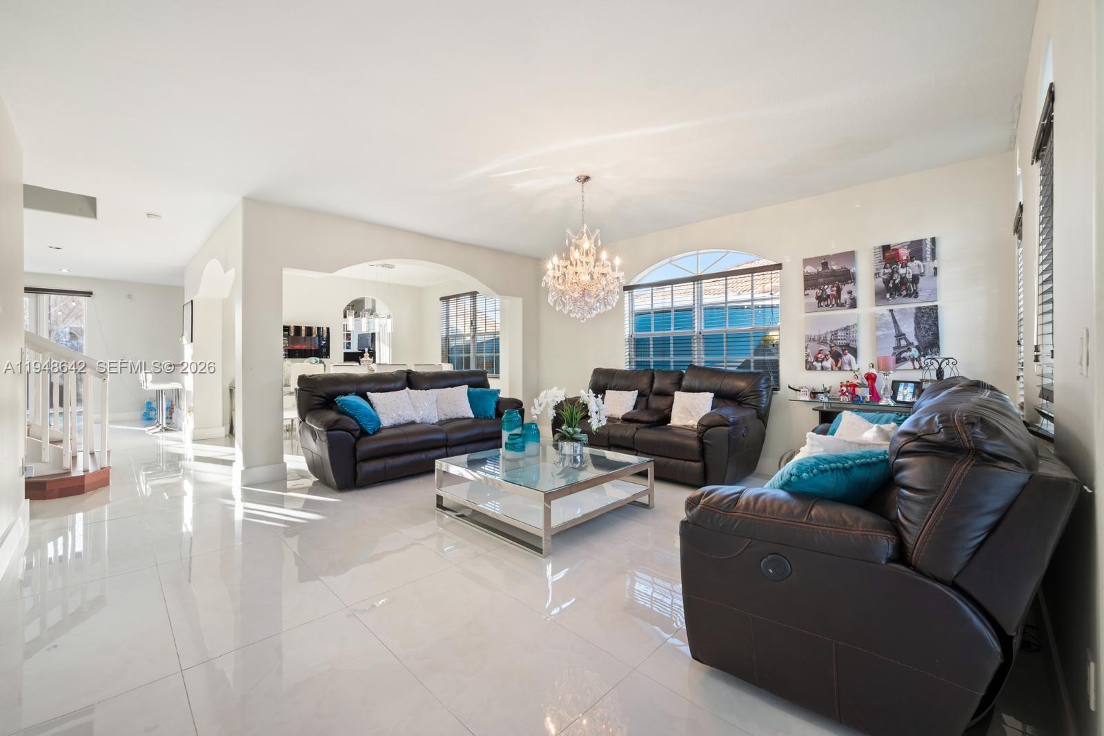 1360 Southwest 142nd Avenue Miami, FL 33184 - Photo 14 of 54 a living room with furniture and a large window