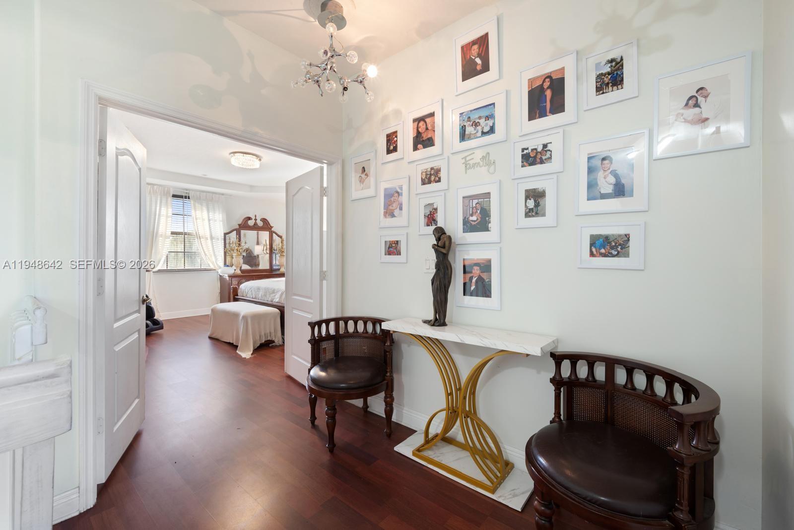 1360 Southwest 142nd Avenue Miami, FL 33184 - Photo 31 of 54 a living room with furniture and a wooden floor