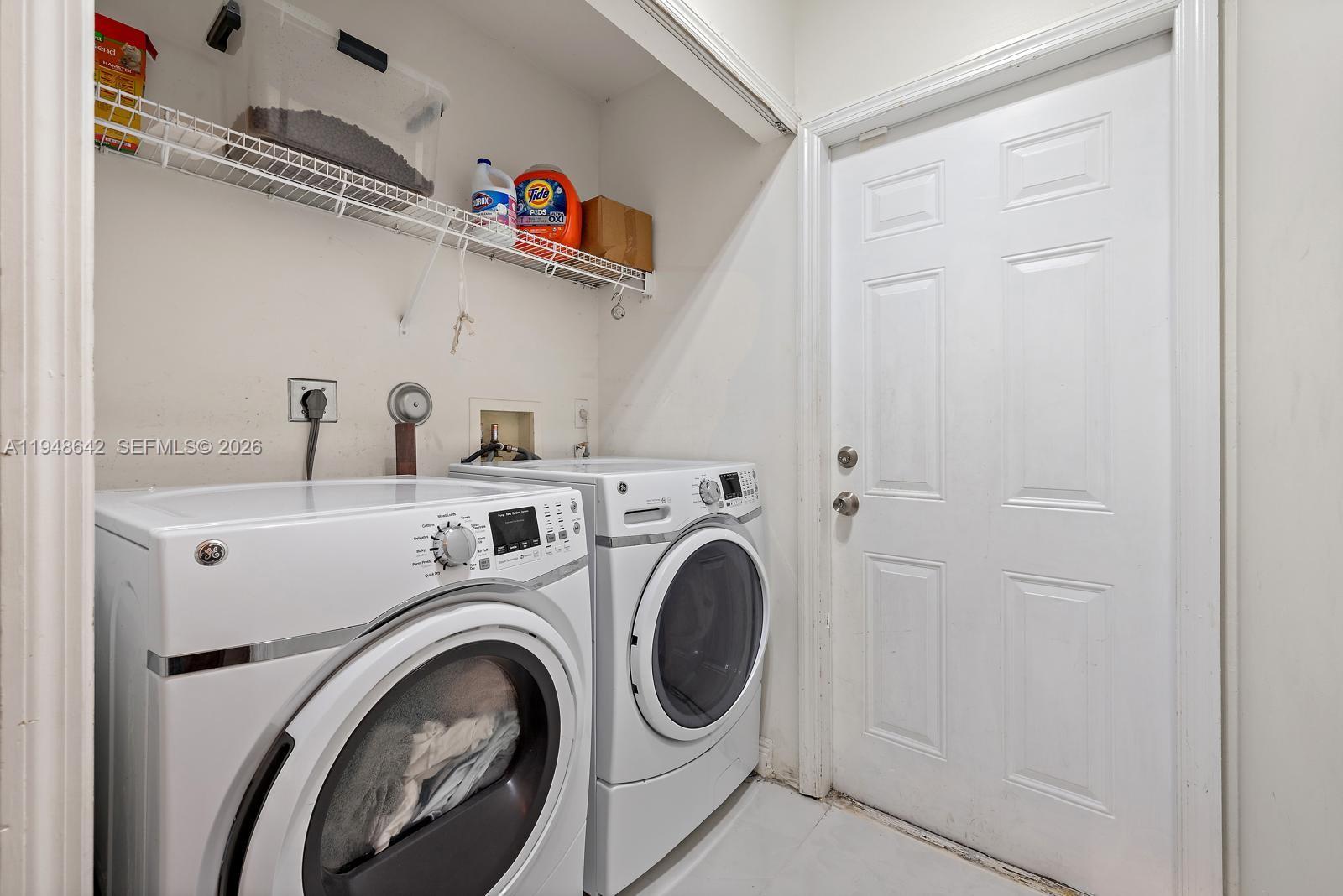1360 Southwest 142nd Avenue Miami, FL 33184 - Photo 36 of 54 a utility room with dryer and washer