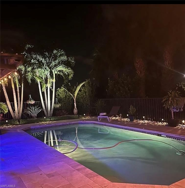 3402 Tigris Lane Naples, FL 34119 - Photo 23 of 50 a view of building with outdoor space